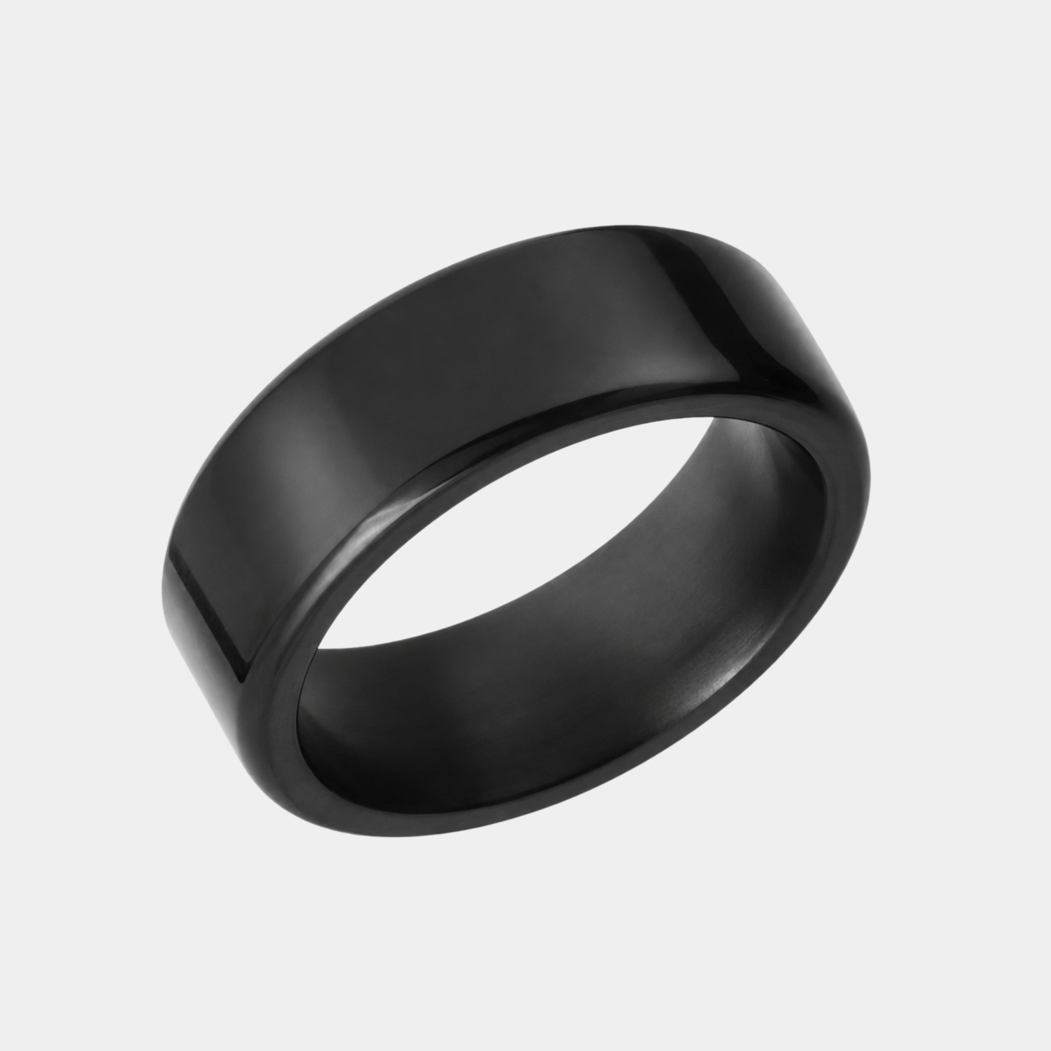 KRATOS 8mm polished solid black diamond wedding band in a three-quarter studio view