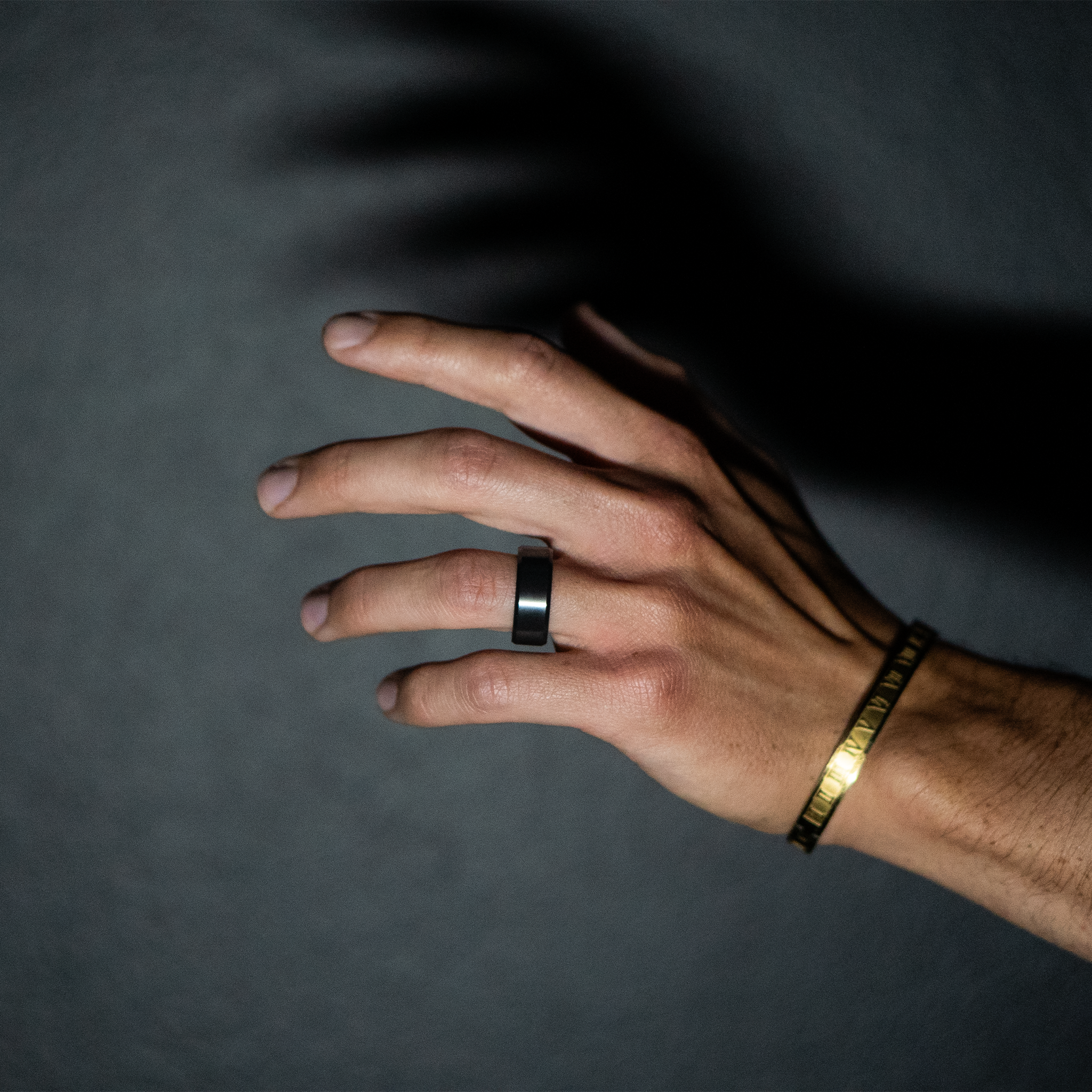 Image of beveled edge, Elysium Black Diamond Ring on hand.