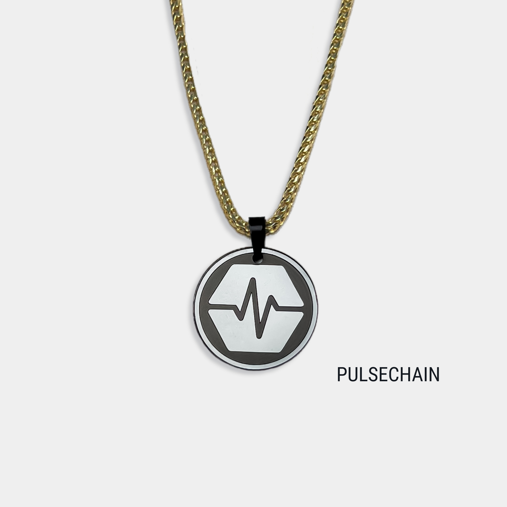 Photo of round solid black diamond pendant with pulsechain symbol engraved, attached to gold chain