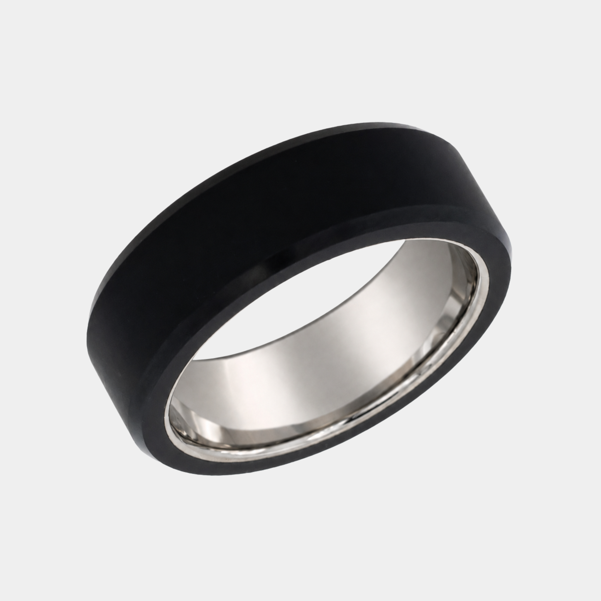 ARES 8mm polished solid black diamond wedding band with a platinum sleeve in a three-quarter studio view