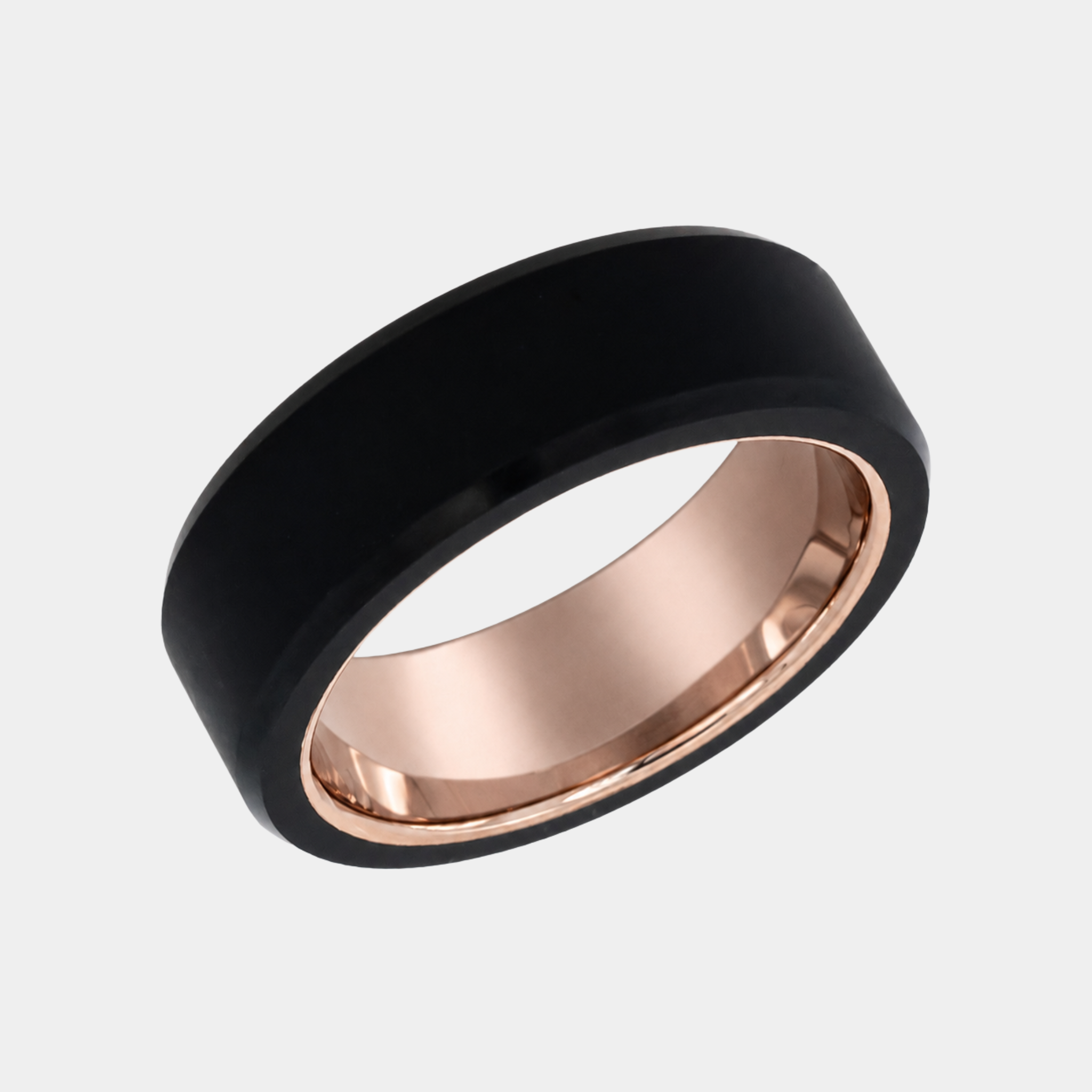ARES 8mm polished solid black diamond wedding band with a rose gold sleeve in a three-quarter studio view